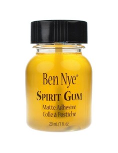 pegamento de resina/alcohol  líquido de color ámbar para aplicar bigotes y barbas